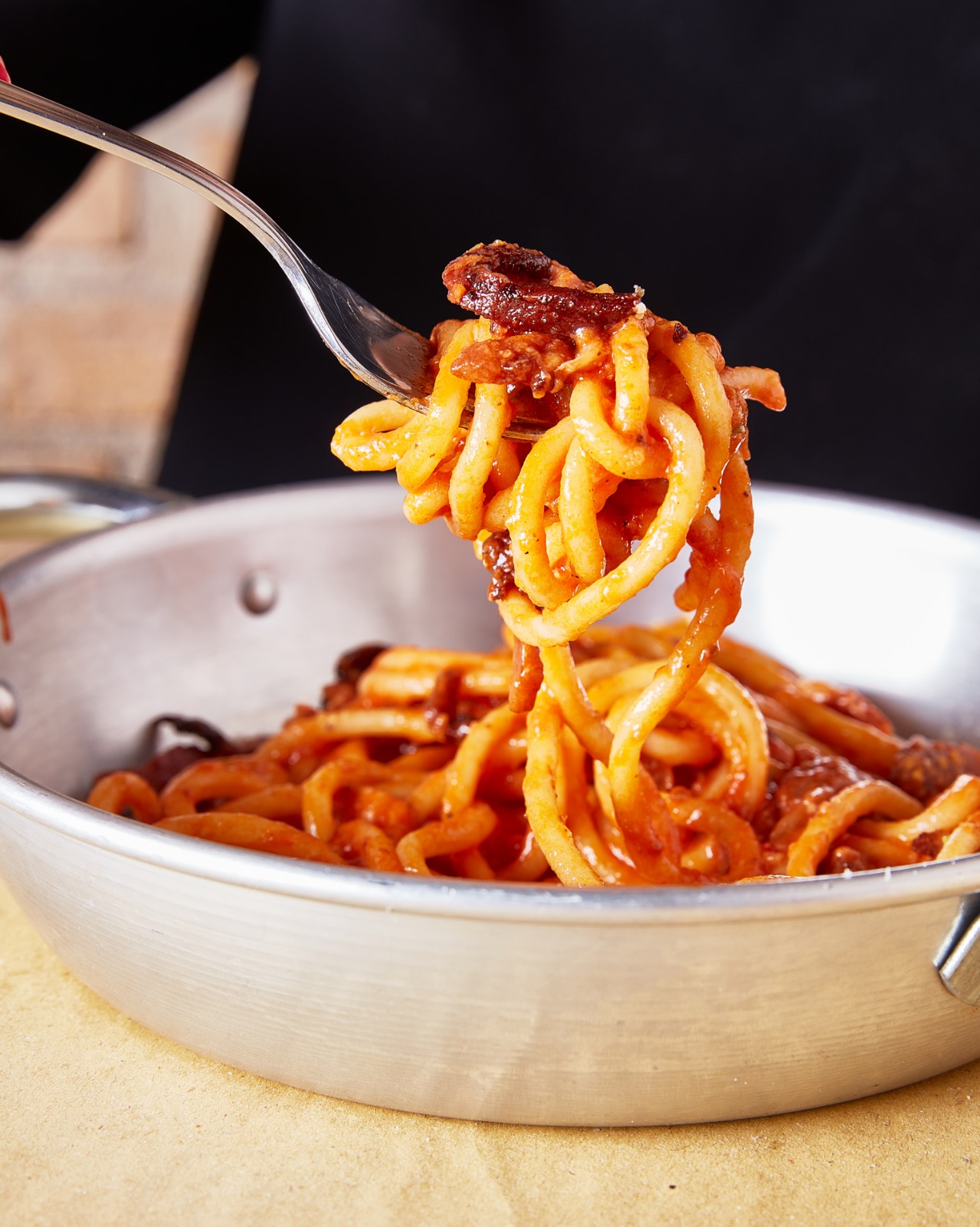 Bowl of handmade pasta with red sauce