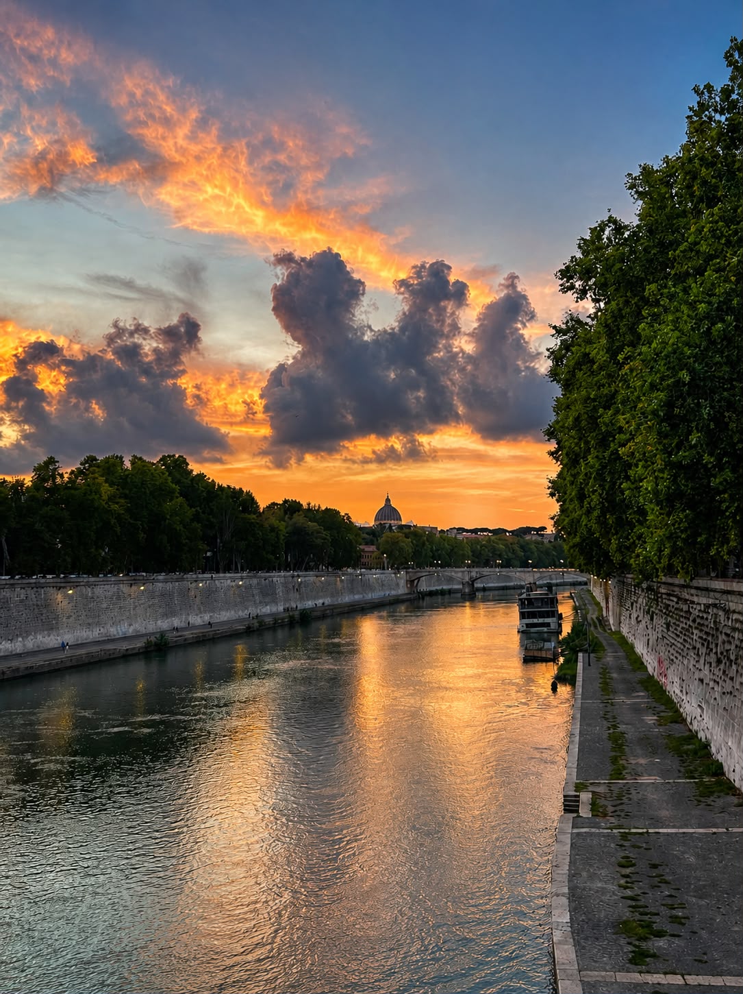 Sunset over the Tiber River in Rome